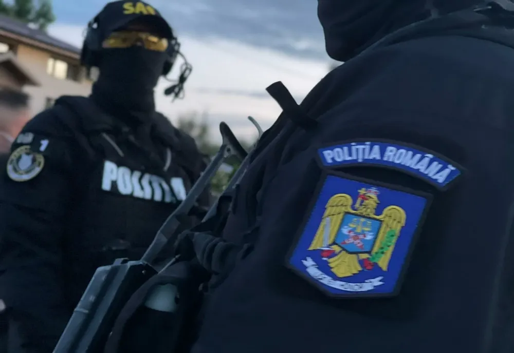 Bătaie cu bâte la o spălătorie auto