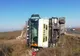 VIDEO|Viteza face victime. S-a  răsturnat cu camionul pe un drum județean