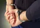 Agent la Penitenciarul Poarta Albă, reţinut pentru mită și introducerea de telefoane mobile în puşcărie