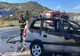 FOTO VIDEO Impact violent între două autoturisme. O mașină a luat foc