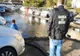 FOTO Parcarea unui bloc inundată cu păcură. Societate amendată drastic