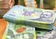 Mai multe categorii de români vor avea venituri mai mari de la 1 martie! Vezi dacă de încadrezi